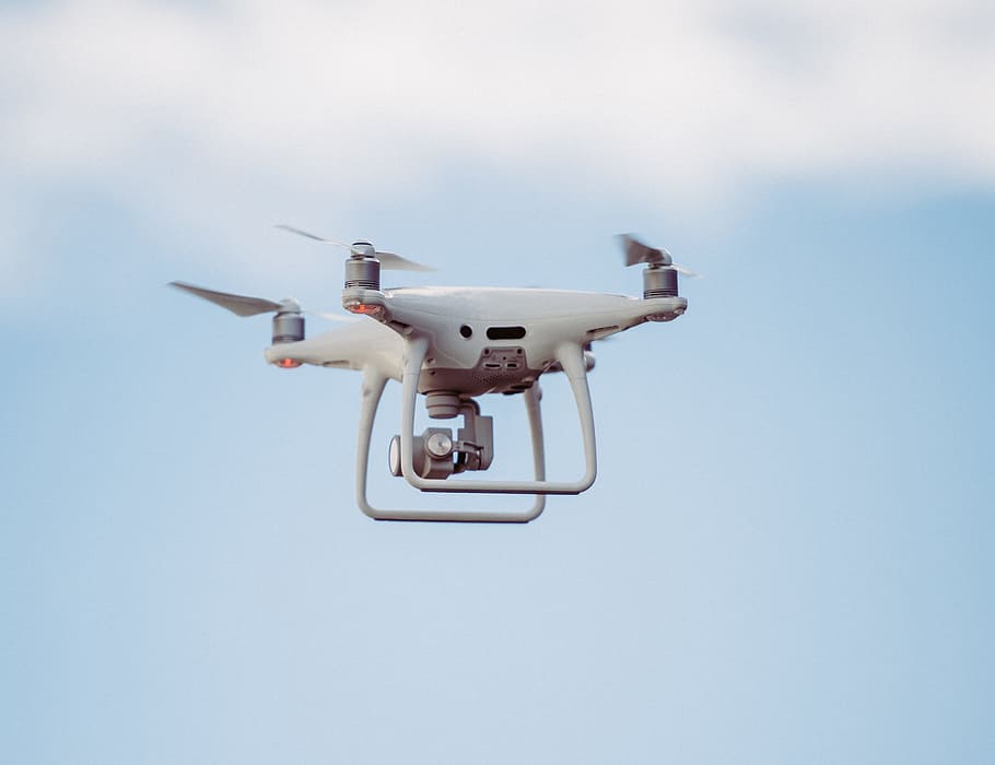 white DJI drone in mid air, white drone quadcopter on focus photo, HD wallpaper