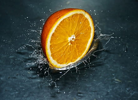 sliced orange citrus fruit on water, falling, splash, fresh HD wallpaper