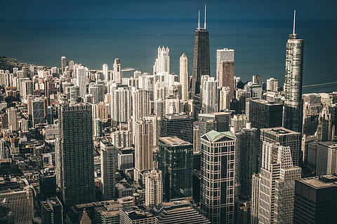 aerial view photography of city buildings near body of water, aerial view photography of city buildings HD wallpaper