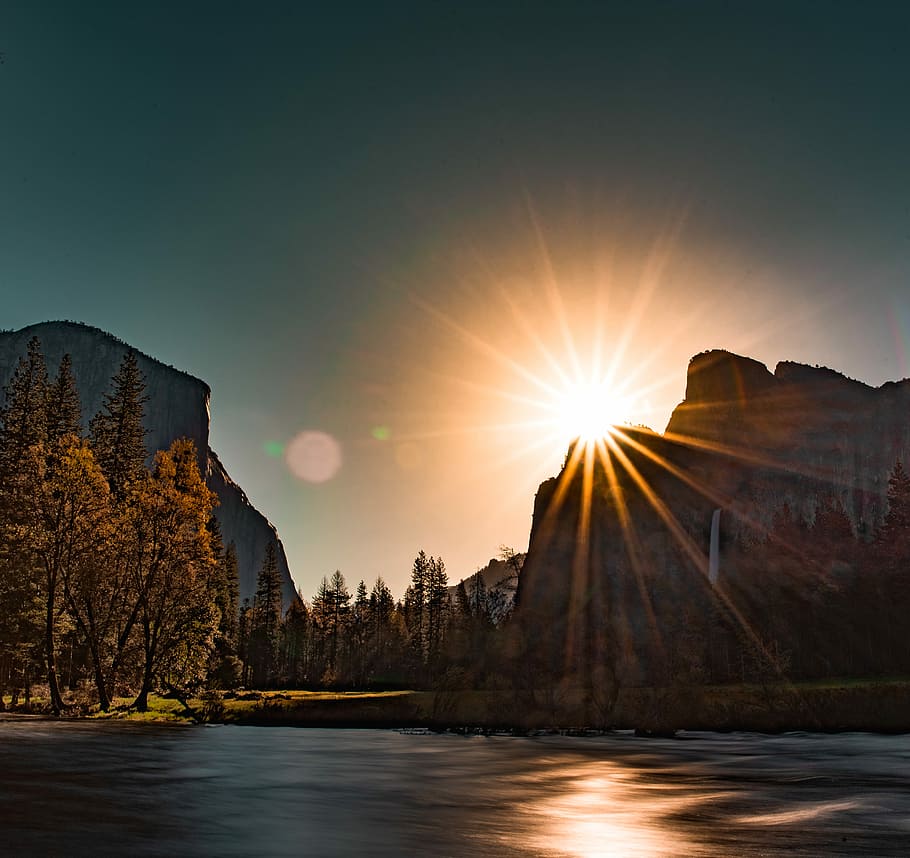 sunrise over mountains near river, landscape photo of sun behind mountain HD wallpaper