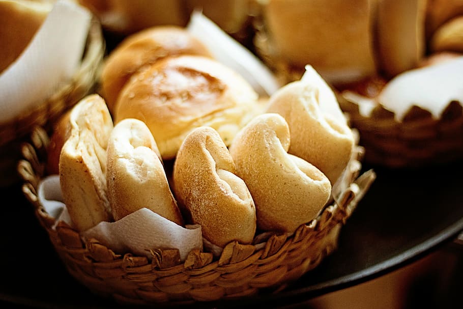baked breads in round brown wicker bowl, rolls, fresh, healthy