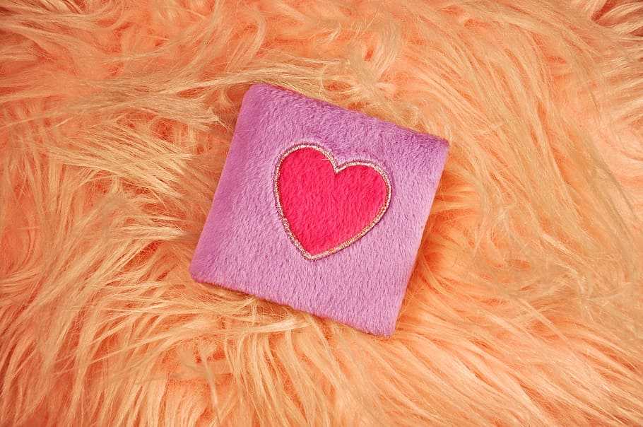 pink box on yellow textile, book, diary, fluffy book, heart HD wallpaper