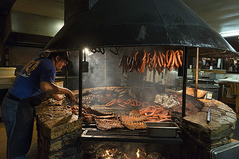 man grilling food on charcoal grill in building, Barbecue, Pit HD wallpaper