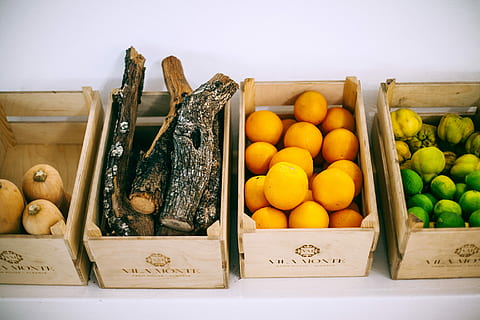 assorted fruits on brown wooden crates, three variety of fruits on boxes and wood log on box HD wallpaper