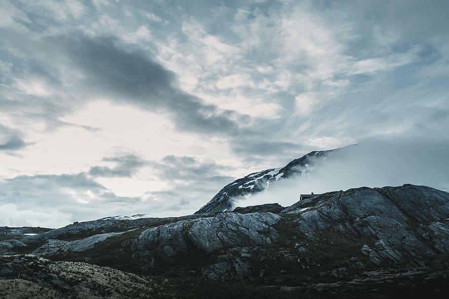 mountain covering with clouds, gray hills under clouds, rock HD wallpaper