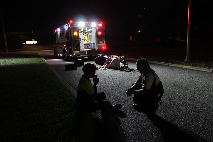 two men sitting on road, Ambulance, Assault, Paramedic, Ptsd