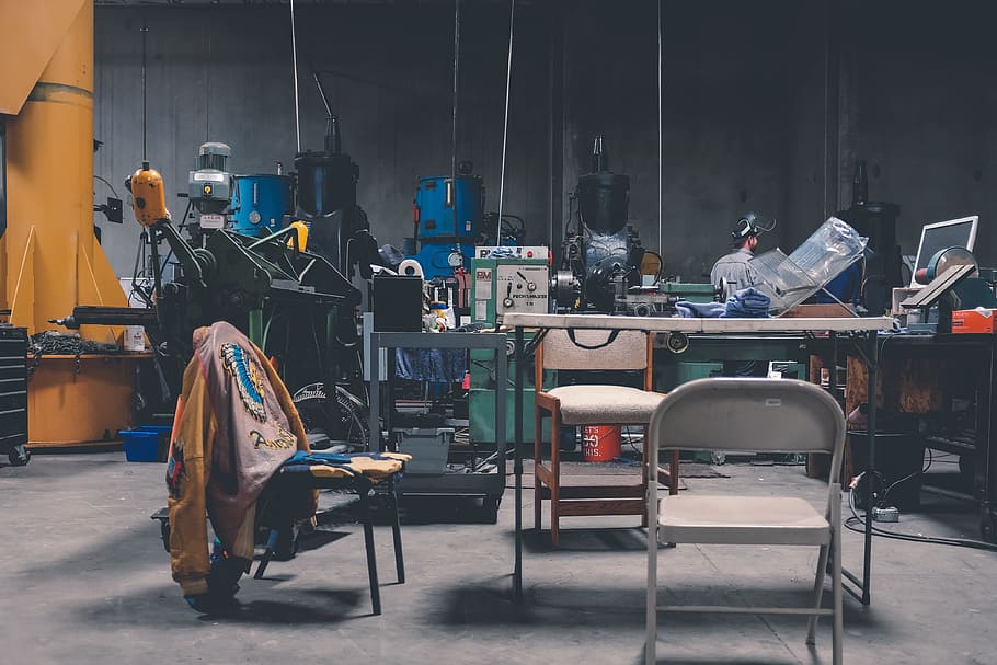 items inside black warehouse, tools, mechanical, chairs, table HD wallpaper