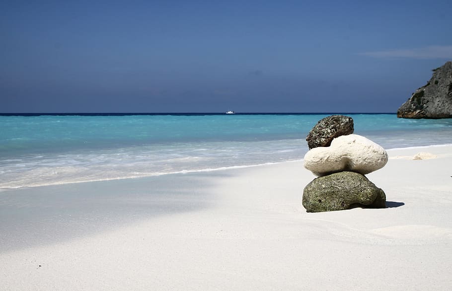 cairn by the sea shore during daytime, beach, curacao, sand HD wallpaper