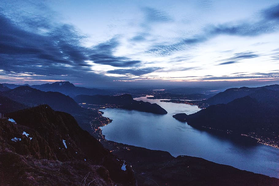 mountains near body of water during sunset, lake water scenery HD wallpaper