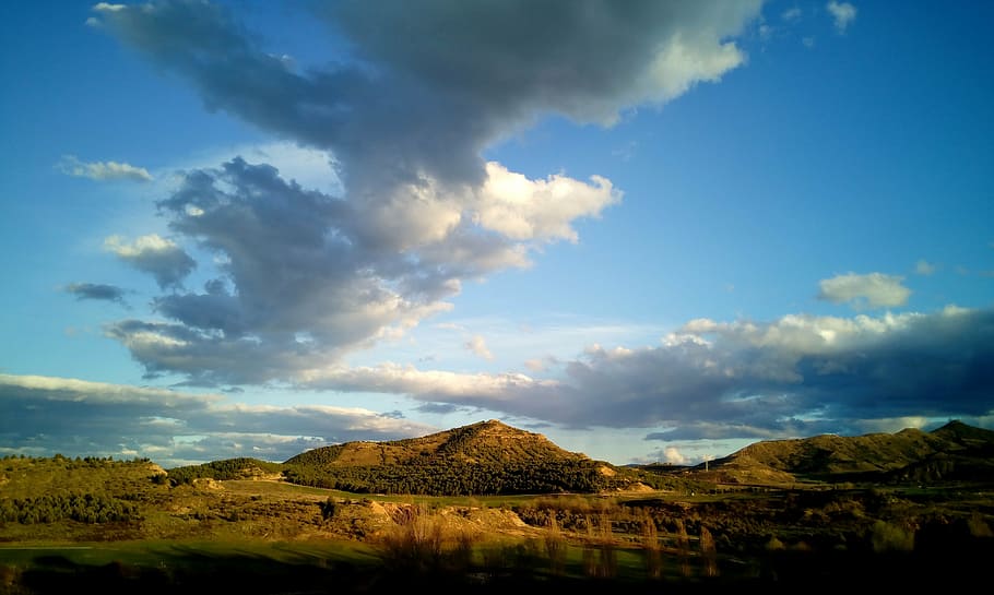 heaven, clouds, landscape, rays, sunset, field, mountain, nature HD wallpaper