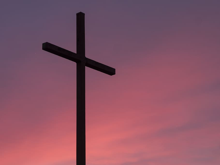 brown wooden cross during golden hour, silhouette of cross, photo
