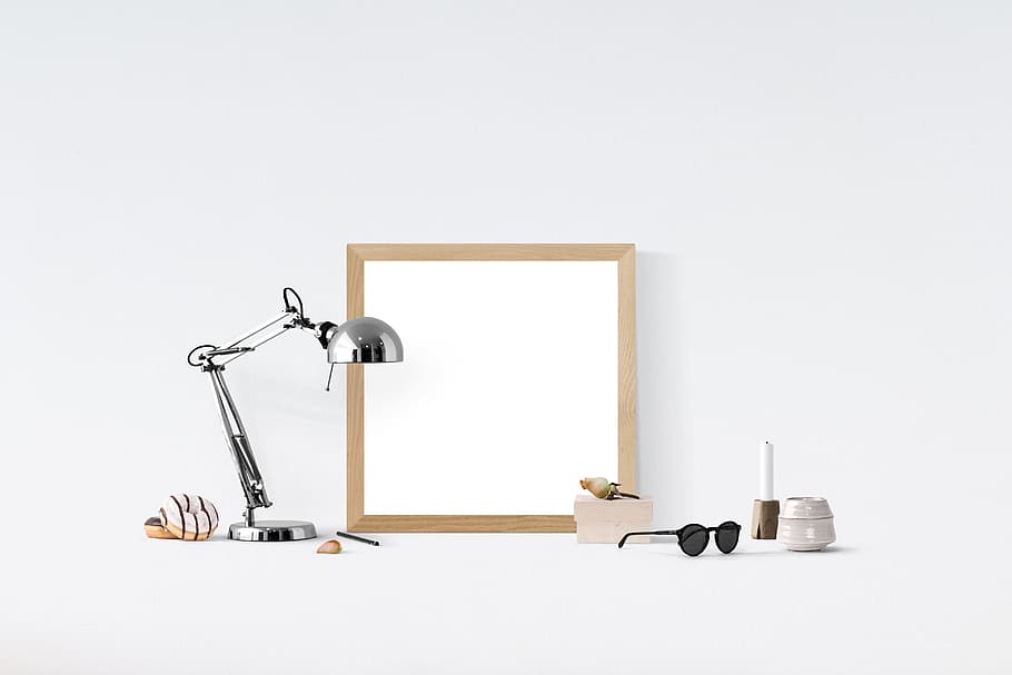 stainless steel desk lamp beside black sunglasses, poster mockup HD wallpaper
