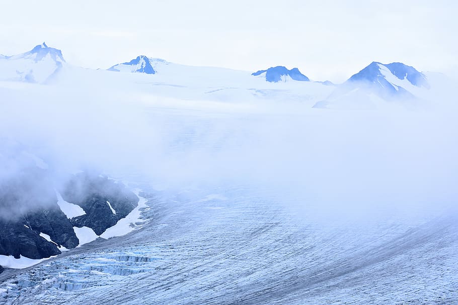 ocean waves photography, high-angle photography of mountain near clouds HD wallpaper