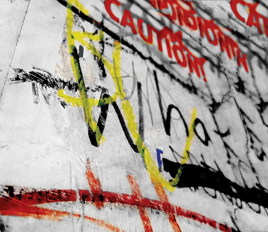 close-up photo of gray and multicolored textile, graffiti, vandalism