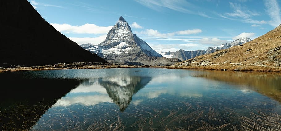 Returning to Switzerland, landscape photography of mountain near lake HD wallpaper
