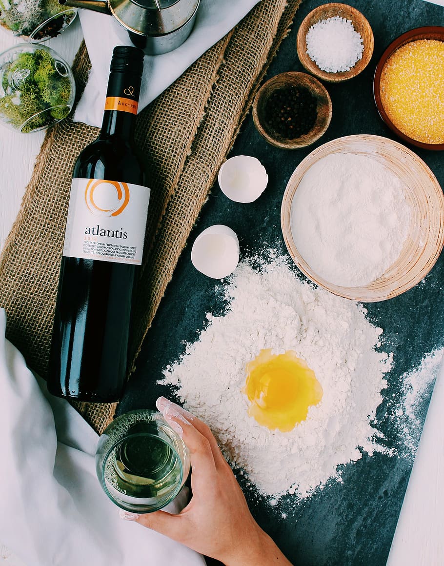Atlantis bottle near white dough with egg yolk, gourmet, posh HD wallpaper