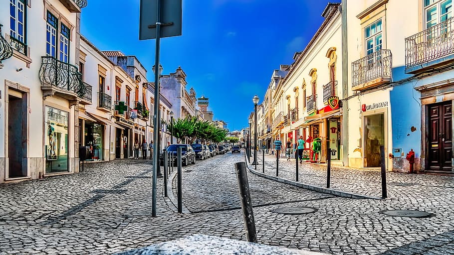 empty road in between white painted buildings at daytime, tavira, HD wallpaper