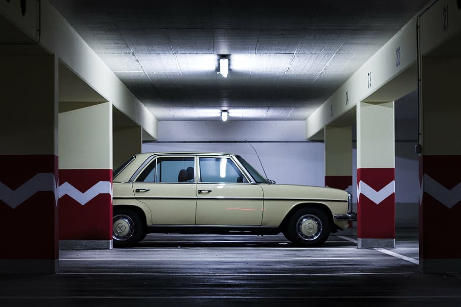 sedan parked in parking lot, underground car park, urban, auto