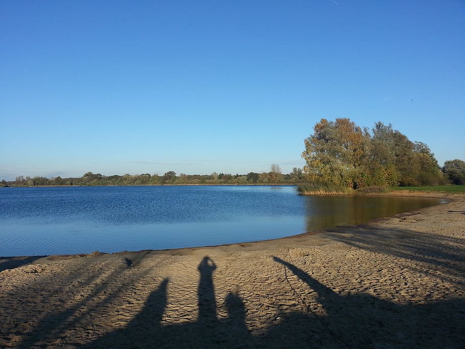 Shadow Play, Human, Lake, Beach, autumn, water, clear sky, nature HD wallpaper