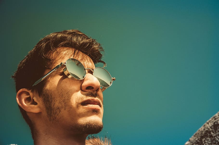 selective photography of man wearing hippie sunglasses, guy HD wallpaper