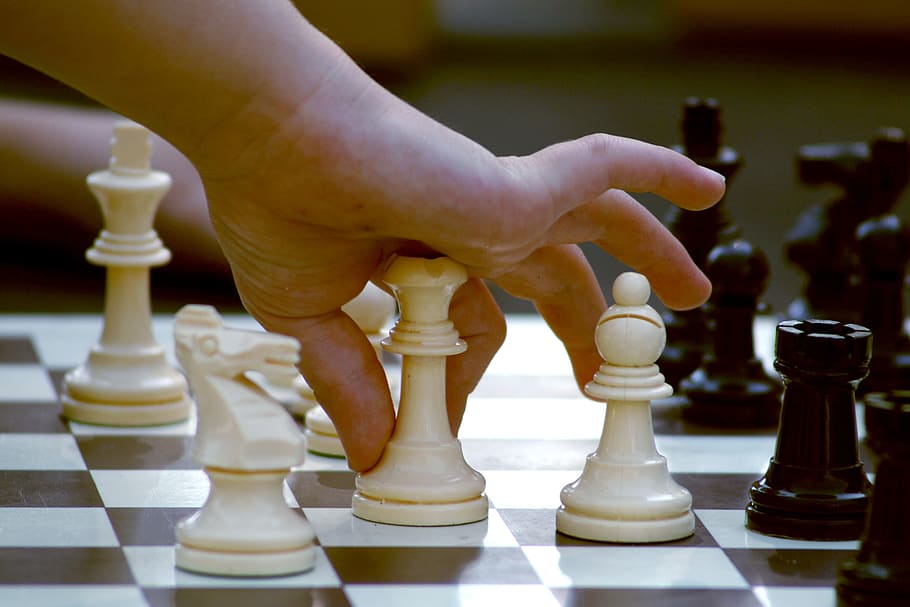 person holding chess piece, game, strategy, board, competition, HD wallpaper