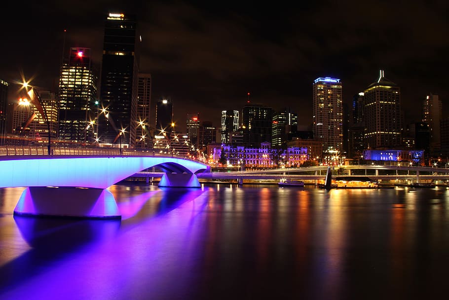 lighted concrete buildings at night, Brisbane River, victoria bridge