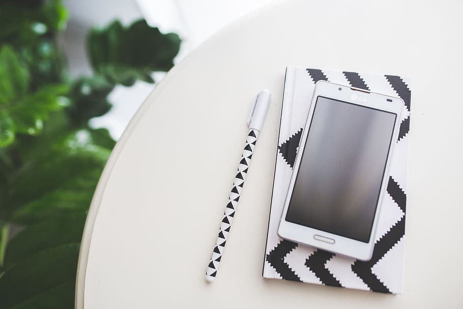 white LG phablet on top of rounded table, tech, technology HD wallpaper