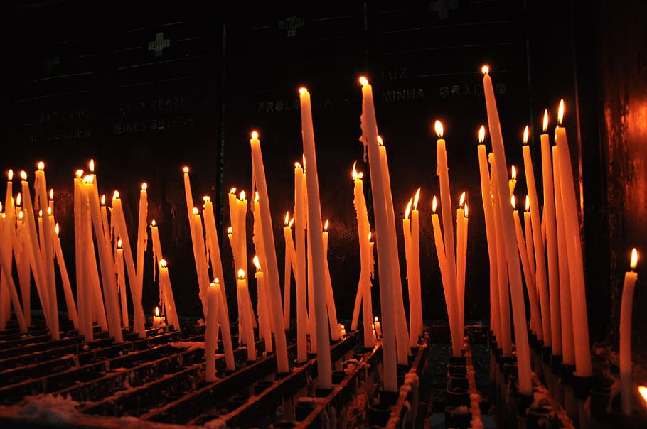 lightened candles on black bars, fire, pray, illuminated, religion HD wallpaper