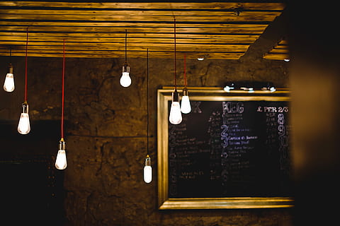 turned on pendant bulb lot beside wall decor, black and red pendant lamp lot HD wallpaper