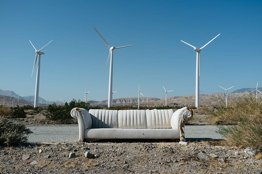 Take a seat, sofa beside the road and view of wind turbine, couch HD wallpaper