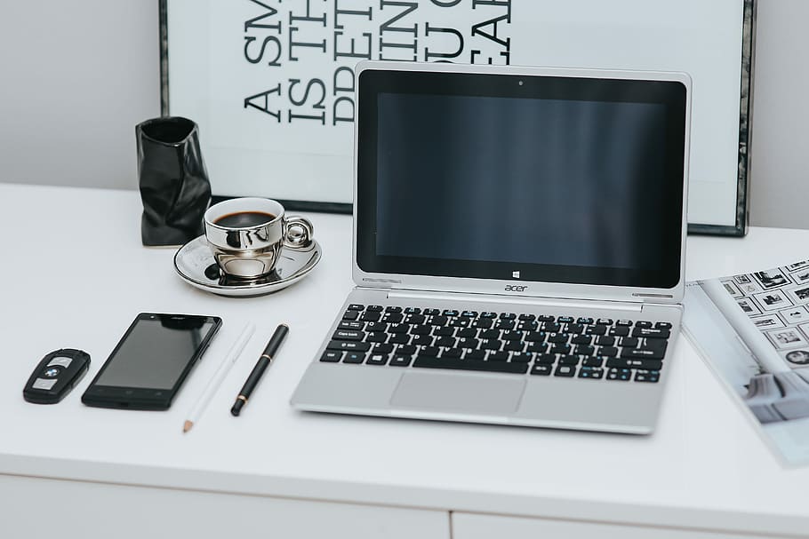 Laptop computer on white desk, interior, minimal, workspace, workplace