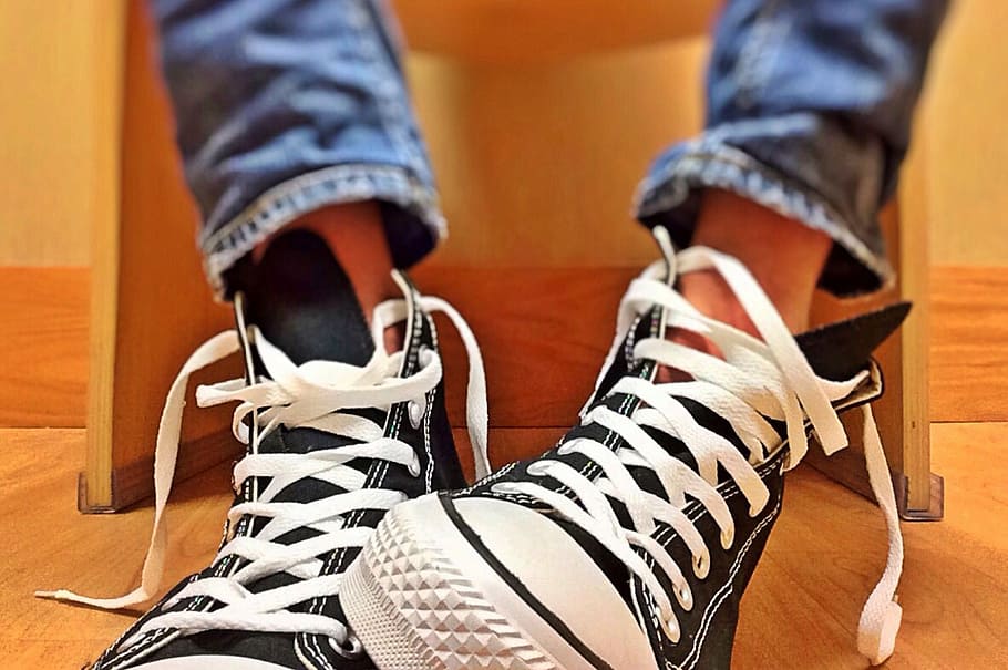 person wearing pair of black high-top sneakers, chucks, converse HD wallpaper