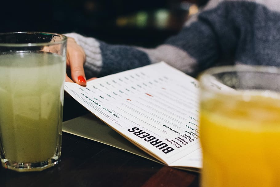 Choosing from a menu, bar, close up, hands, restaurant, drink HD wallpaper