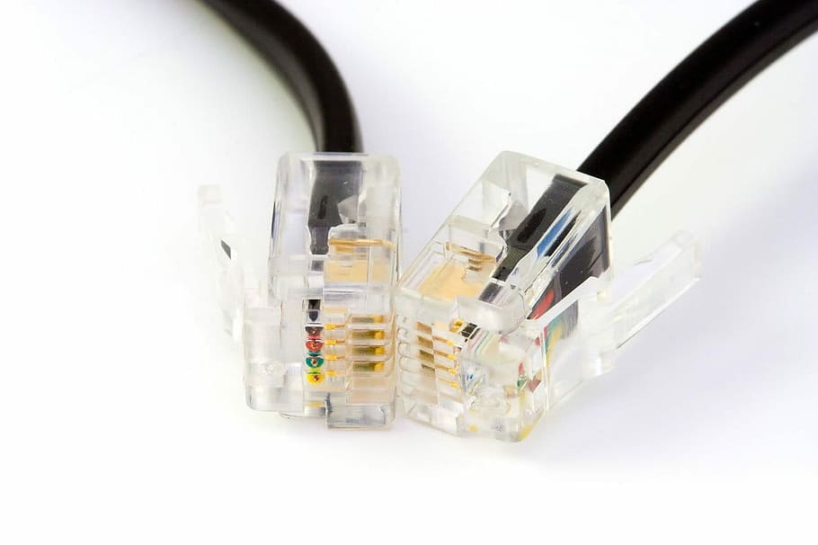 close up photo of RJ45 cable and UTP cable on white surface HD wallpaper