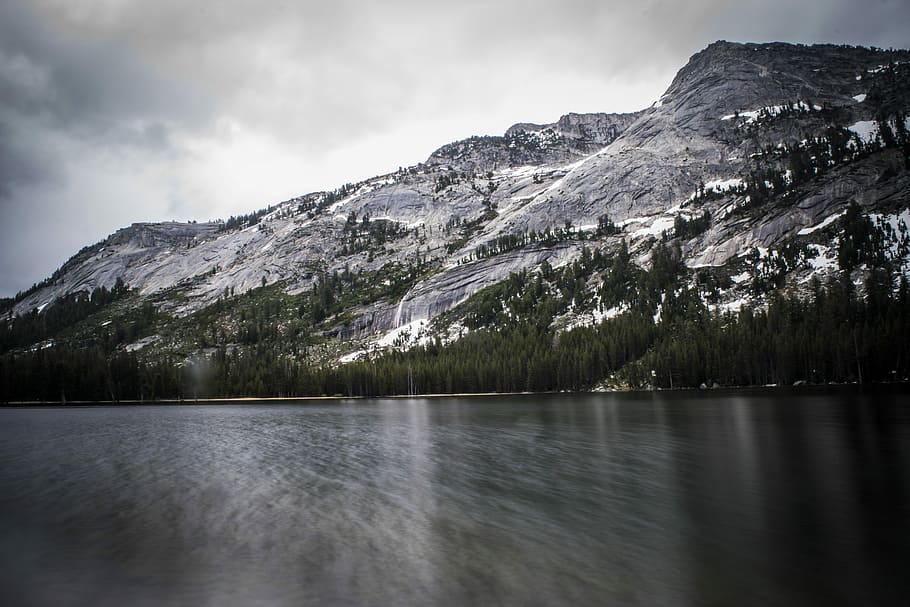 long exposure photo of body of water and mountains, landscape photography of mountains and trees HD wallpaper