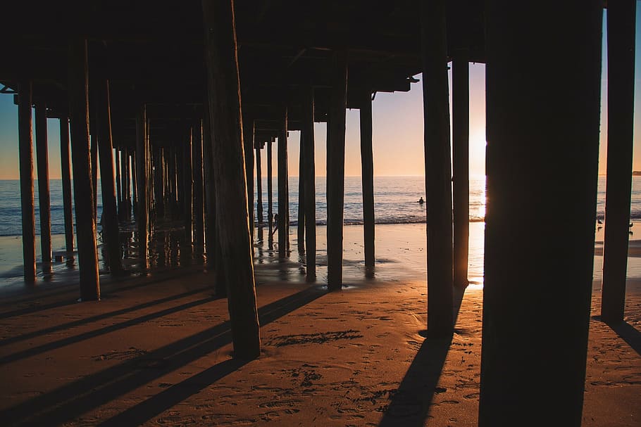 pier, wooden, jetty, underneath, sunset, sunrise, shadows, ocean HD wallpaper