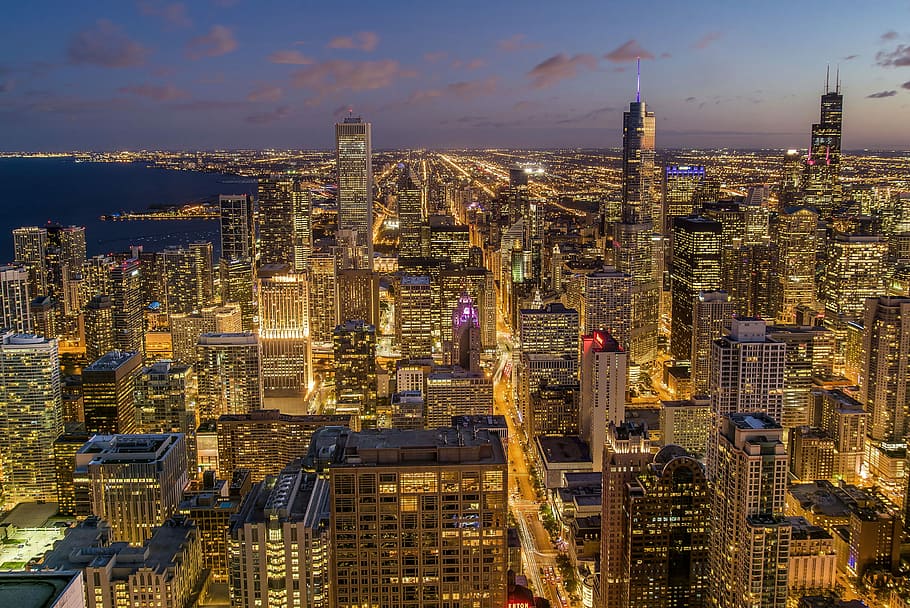 city buildings, photo of city near body of water during night time HD wallpaper