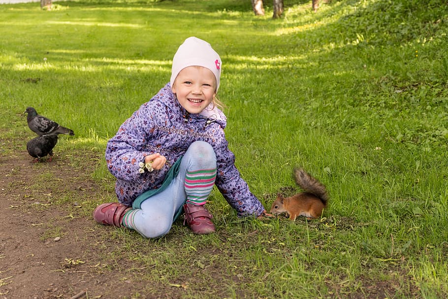 girl wearing purple jacket beside squirrel, Kids, Love, Family
