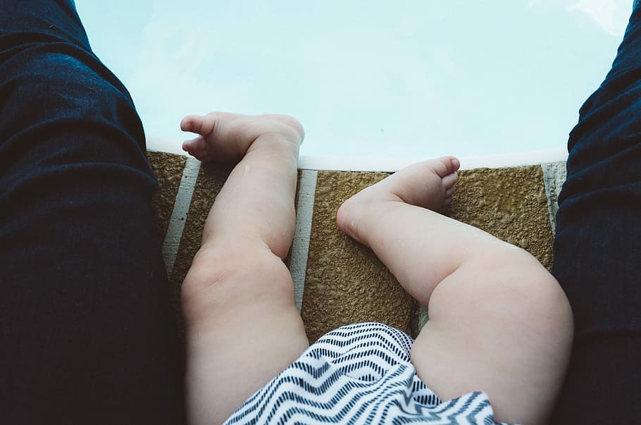 baby's white and gray striped bottoms, toddler sitting on brown concrete surface HD wallpaper
