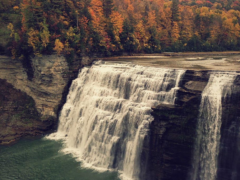 waterfalls near brown and green leaf trees, photo of waterfalls HD wallpaper