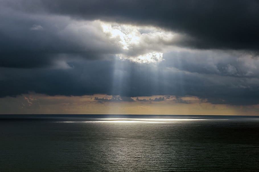 photo of ocean with crepuscular rays, sky, clouds, cloudy, seascape