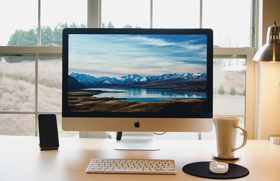 silver iMac ad wireless keyboard, white iMac on white wooden table HD wallpaper