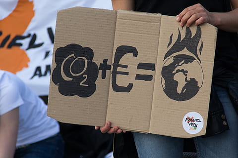 person holding cardboard signage, protest, demo, climate, protest action HD wallpaper