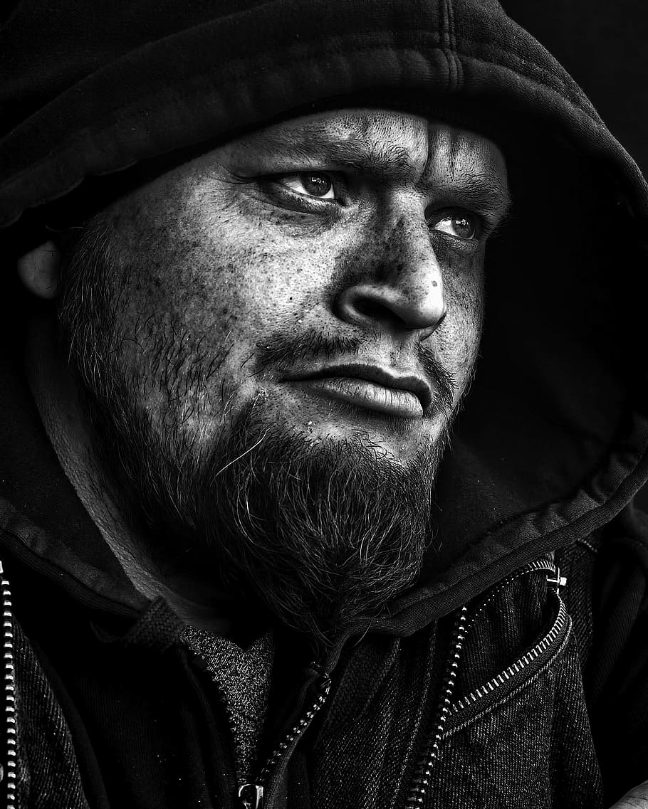 black and white photo of man with hooded jacket, people, homeless