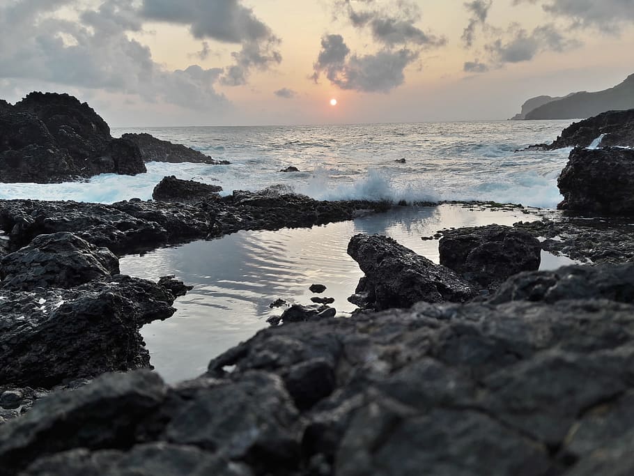 beach, sunset, sea, water, sky, rock, rock - object, solid HD wallpaper