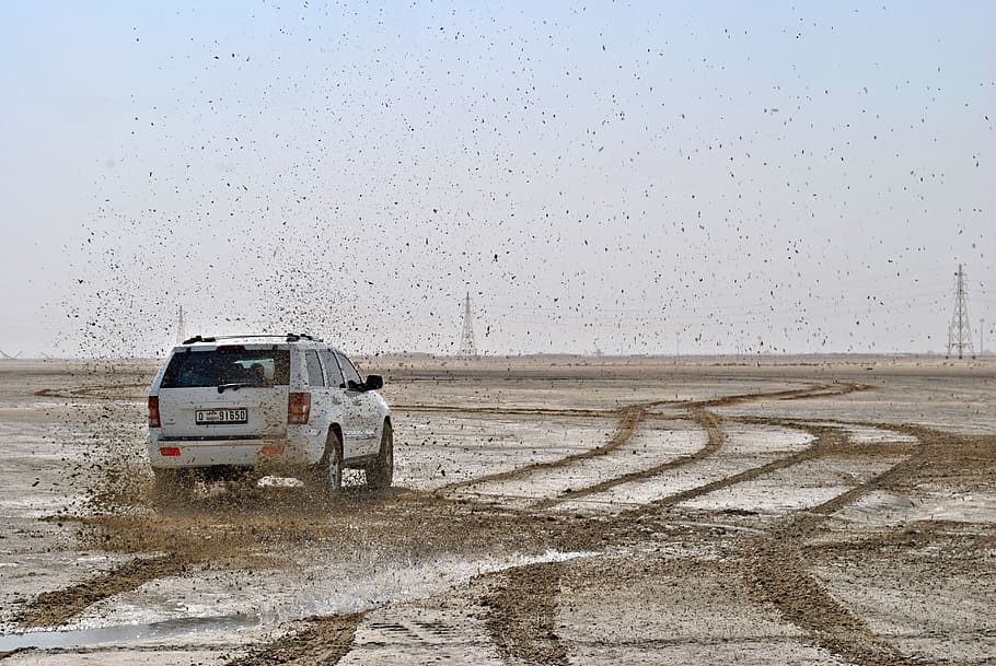 Photo of White Suv on Muddy Plain, desert, dirt, environment HD wallpaper