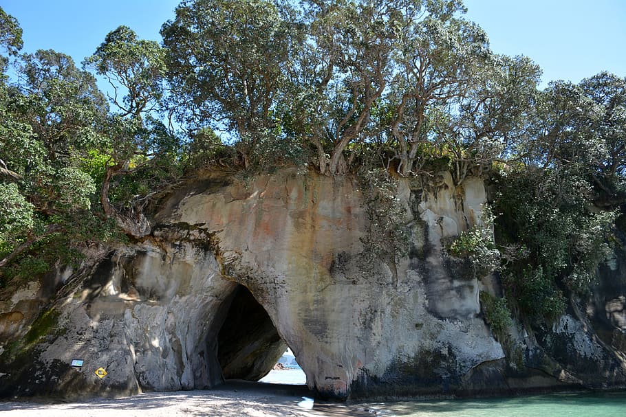 landscape photography of cave rock formation, Cathedral Cove