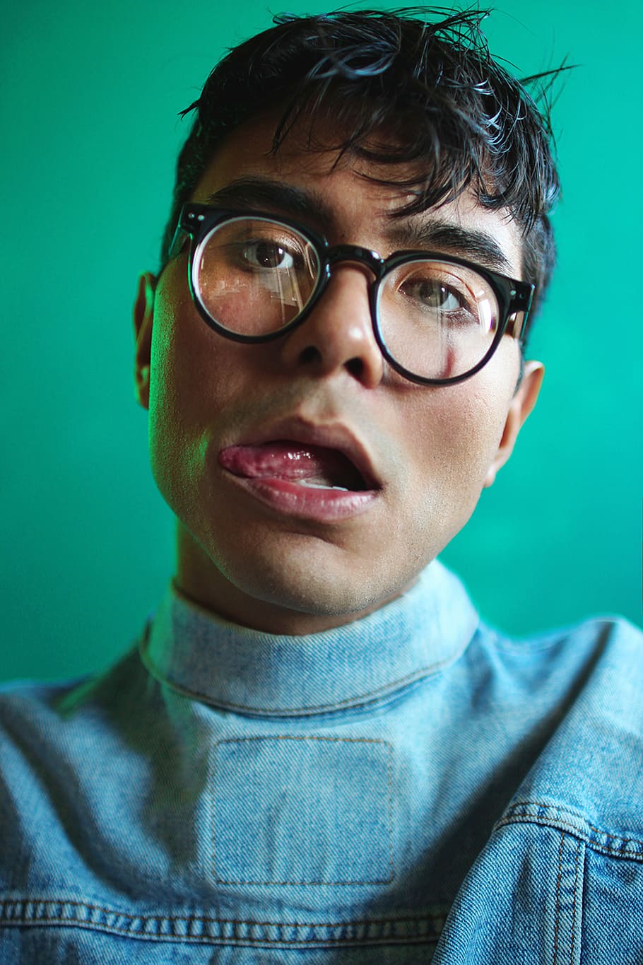 man showing tongue on camera, man showing tongue, portrait, person HD wallpaper