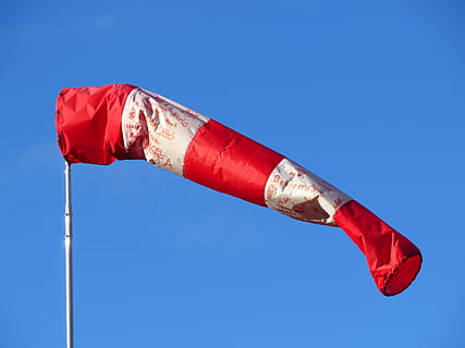 red and white air tube flag with pole, wind direction indicator HD wallpaper