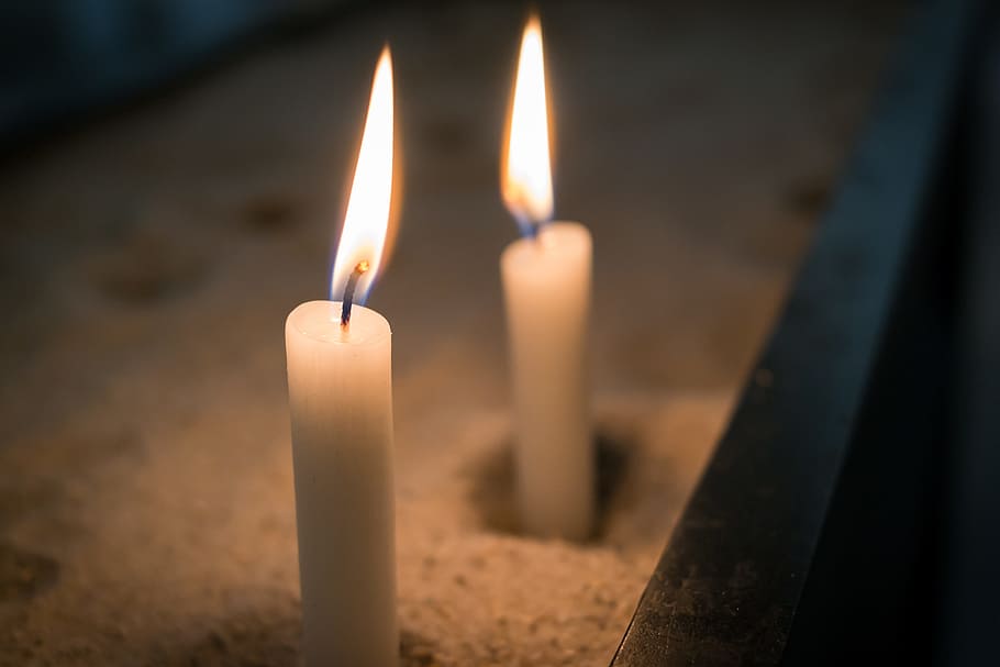 shallow focus photography of two white candles with light, flame HD wallpaper